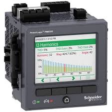 Schneider Electric PowerLogic PM8000 device showing harmonic analysis and power data on screen
