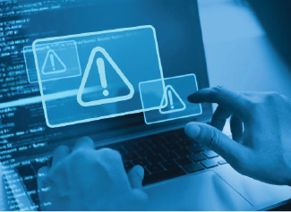Hands typing on a laptop with warning alert icons floating above the keyboard.