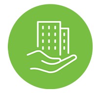 White line art of a hand holding two buildings on a green circular background.