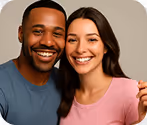 Smiling man and woman embracing against a plain background.
