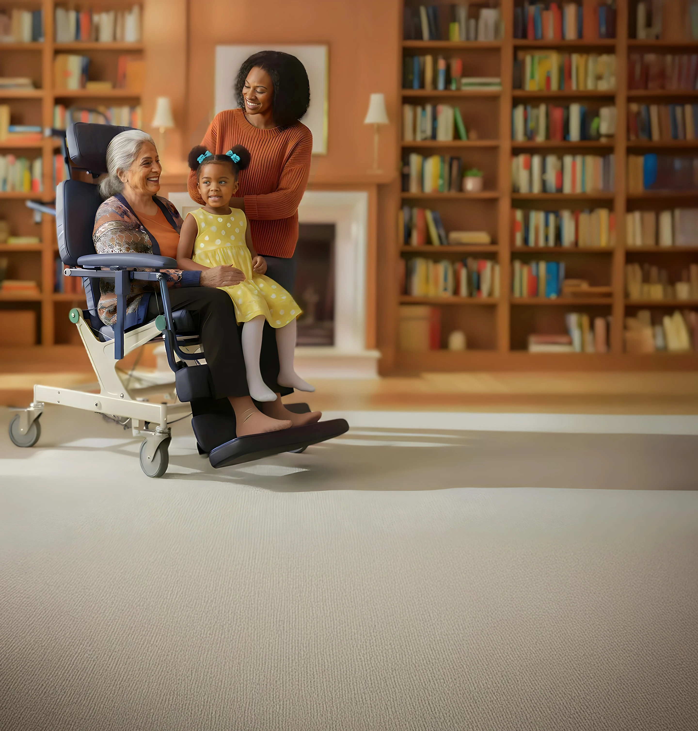 Smiling elderly woman in a wheelchair holding a young girl in a yellow dress while a woman in an orange sweater stands behind them in a cozy room with bookshelves.