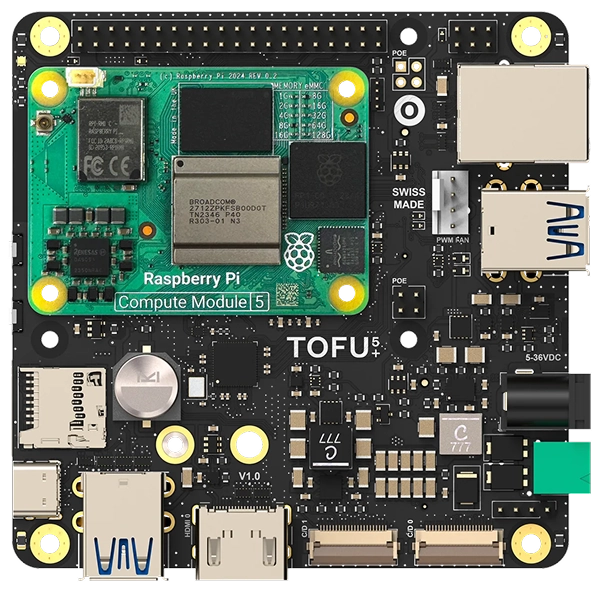 Top-down view of a TOFU 5+ board with a Raspberry Pi Compute Module 5 installed, showing various ports, connectors, and electronic components on a black circuit board.