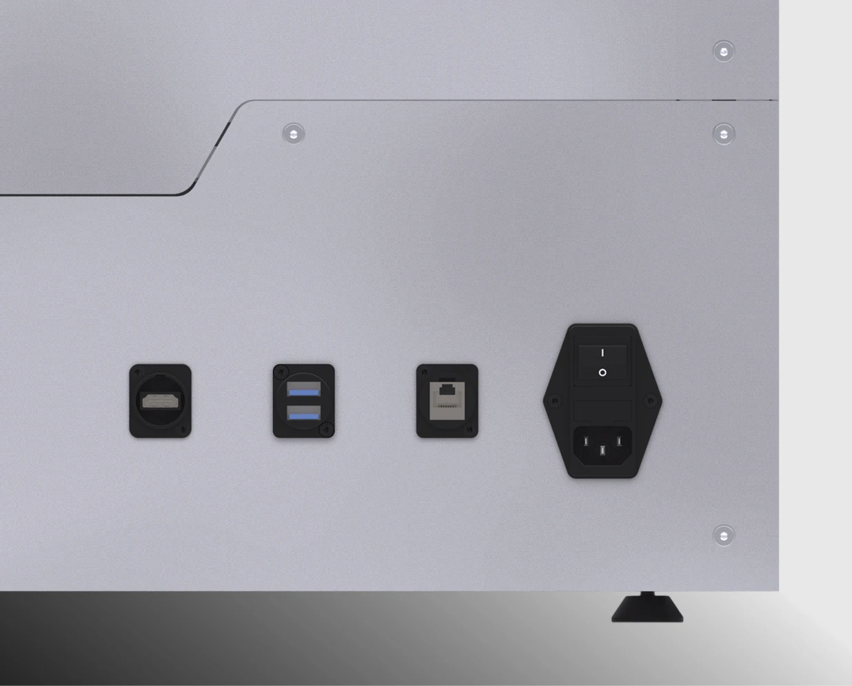 Close-up view of a metallic device back panel showing HDMI port, two USB ports, Ethernet port, and power inlet with on/off switch.