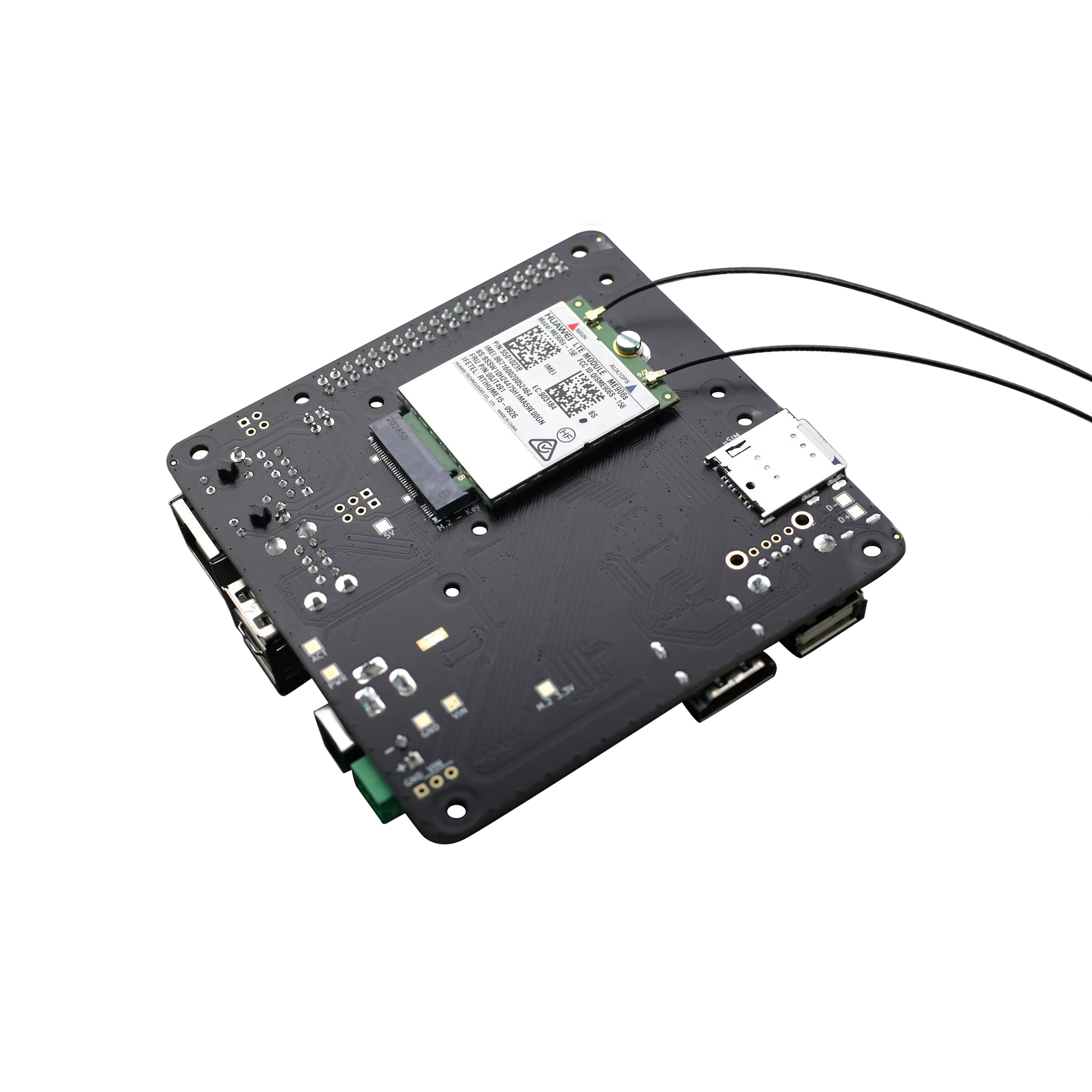 Black circuit board with a Huawei LTE module and attached antenna wires.