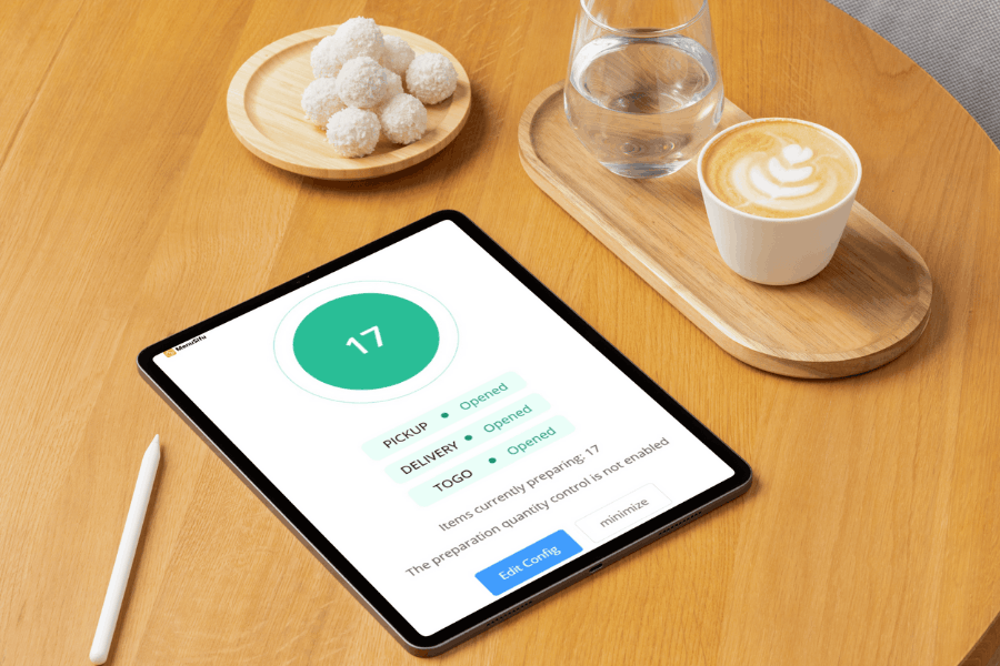 iPad screen showing a platform for restaurant online orders and real-time traffic alerts.