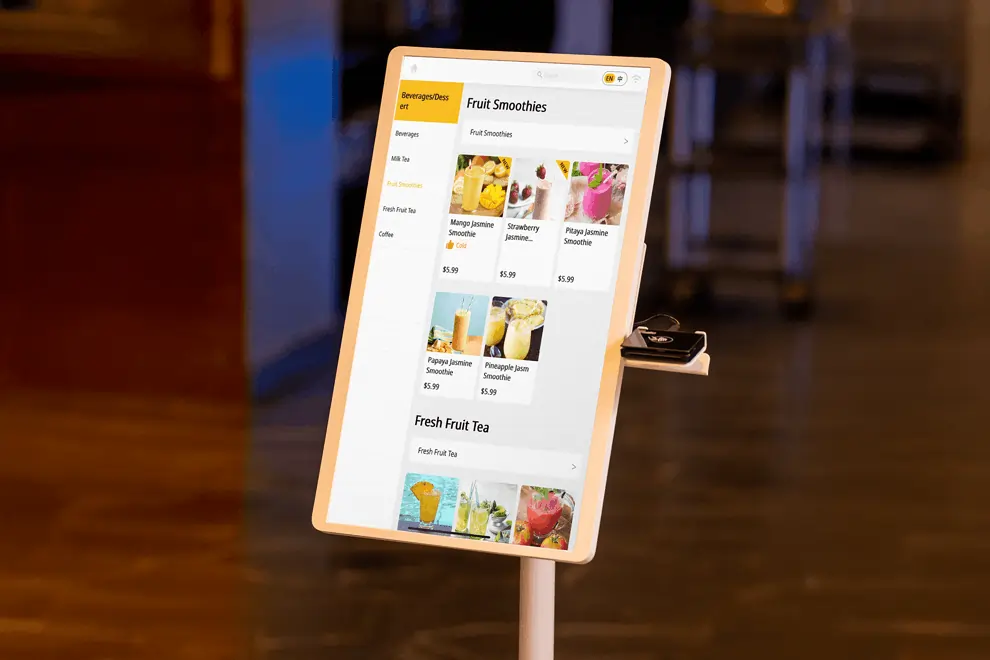 Touchscreen kiosk with menu items featuring editable tags like “Cold” to streamline ordering and guide customer preferences.
