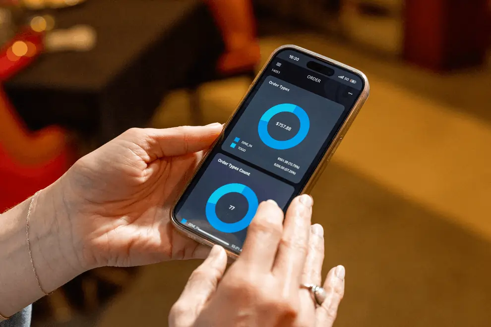 Analyzing order types and sales data from a restaurant POS system on phone.