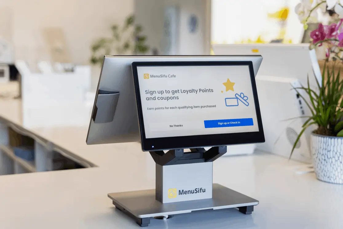MenuSifu POS screen displays loyalty sign-up prompt at a modern cafe counter, encouraging customers to join for points and rewards.