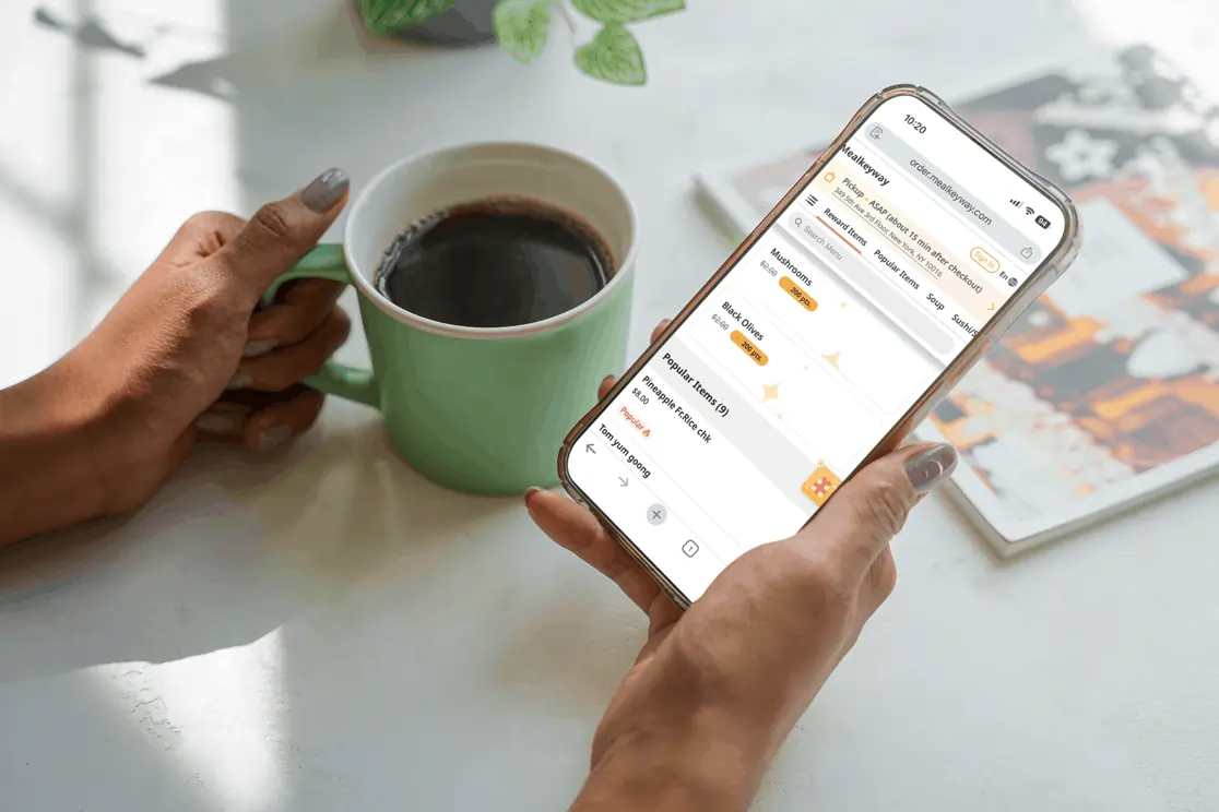 Viewing reward items on a mobile food ordering app using an online restaurant POS loyalty system.