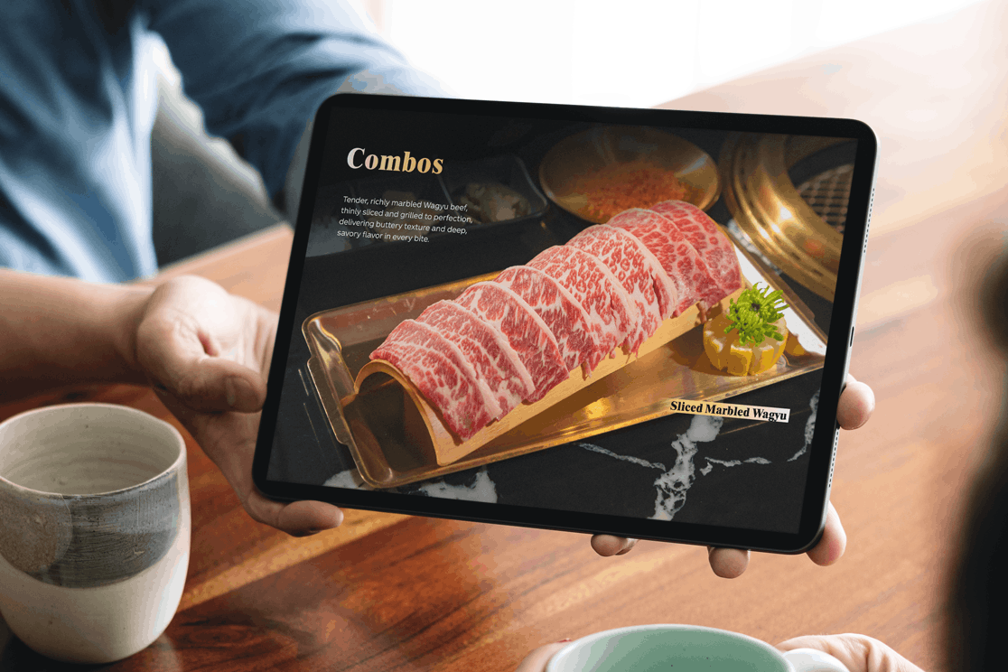 Sliced marbled Wagyu beef combo featured on a tablet eMenu at BBQ restaurant for digital ordering.