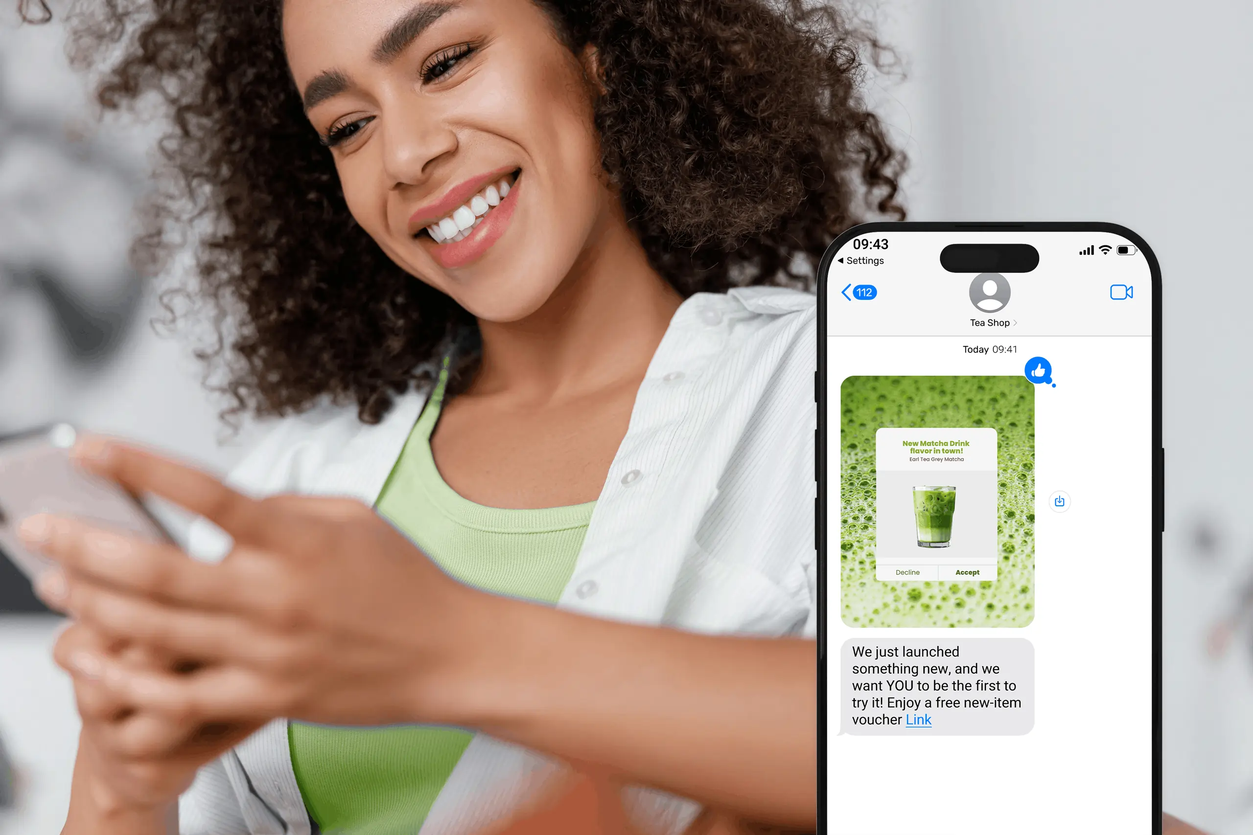 Happy guest gets new item offer through restaurant sms marketing.