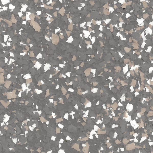 Close-up of epoxy floor coating with flake chips in shades of gray, white, and tan.