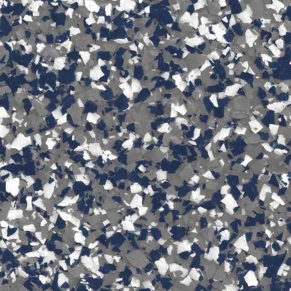 Close-up of epoxy floor coating with blue, white, and gray flake chips scattered evenly.