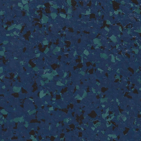 Close-up of a blue epoxy floor with scattered green and black flakes.