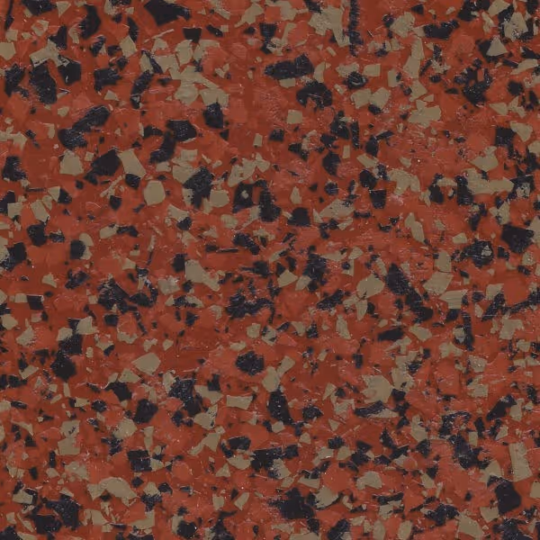 Epoxy flake flooring in terracotta with scattered black and beige flakes.