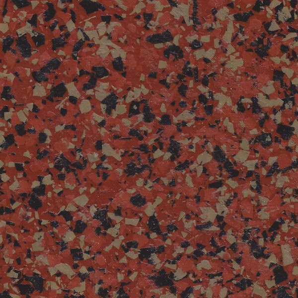 Epoxy flake flooring in terracotta with scattered black and beige flakes.