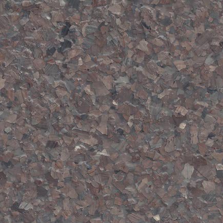 Close-up of a textured surface with small, irregular, dark reddish-brown and gray stone fragments.