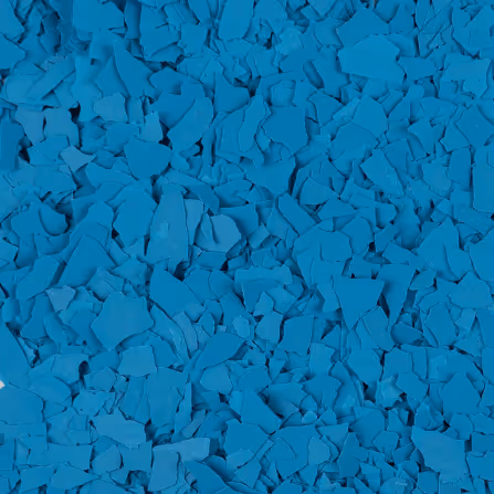 Close-up of small irregular blue flakes forming a textured surface.