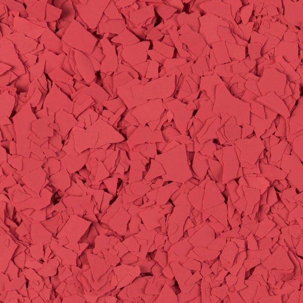 Close-up of irregular red flakes scattered densely.