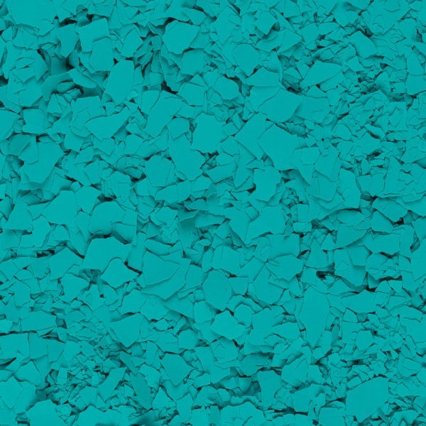 Close-up of numerous small, irregular teal flakes scattered densely.