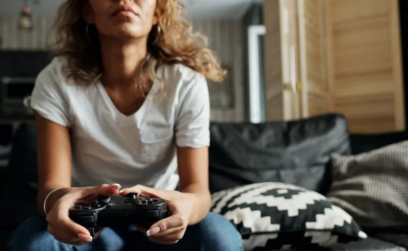 Woman playing videogames