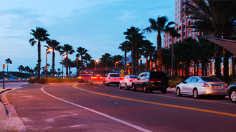 Cars driving by the office of a Clearwater personal injury attorney.