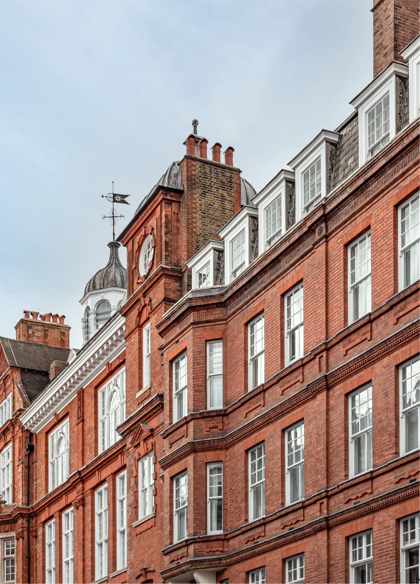 Red brick facade of Henrietta Experimental boutique hotel, Covent Garden, London