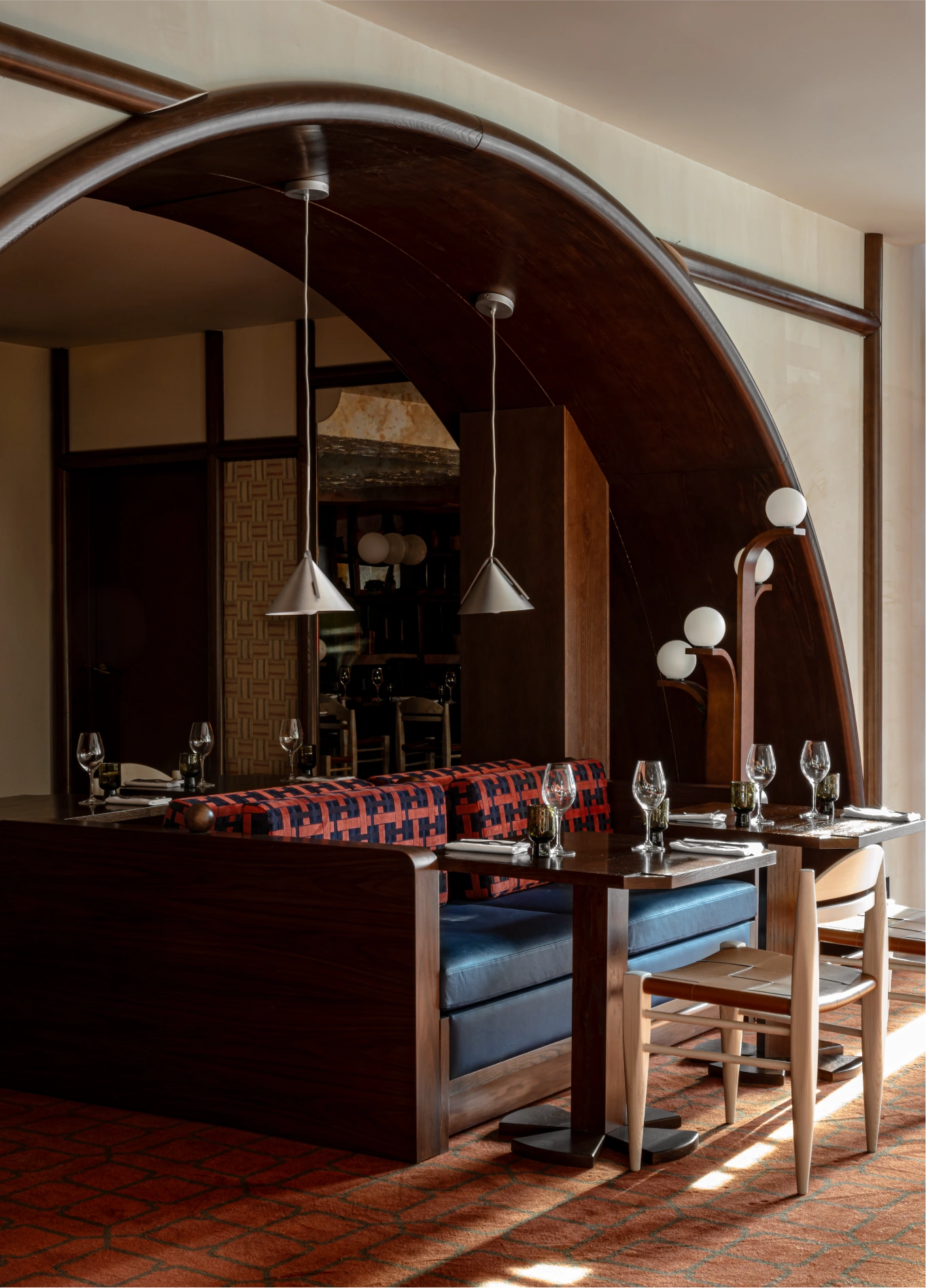 Warm arched dining room at L'Aigle d'Or restaurant, Experimental Chalet, Val d'Isère