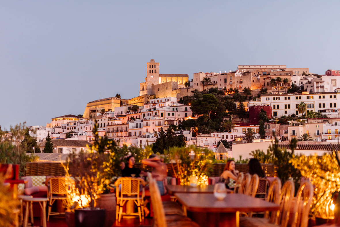 Breathtaking view from a Rooftop Ibiza bar, showcasing the vibrant atmosphere and stunning scenery at Montesol Hotel.