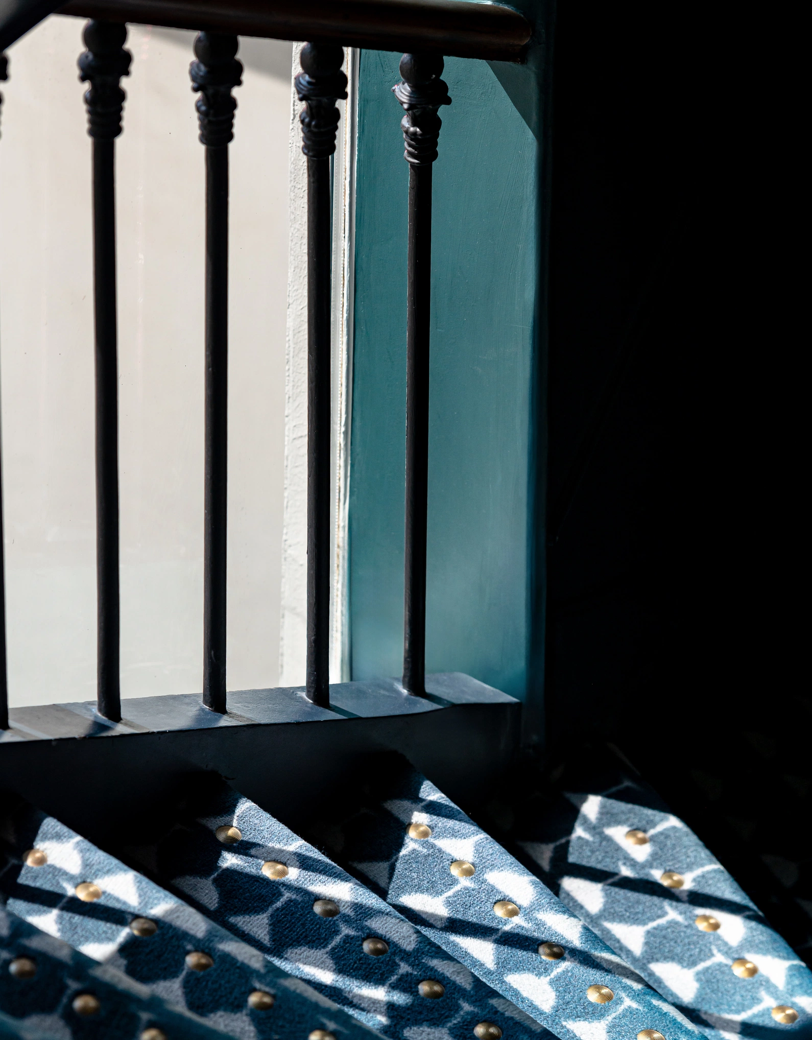 Architectural detail with dark columns and clean lines in an Experimental Group establishment.