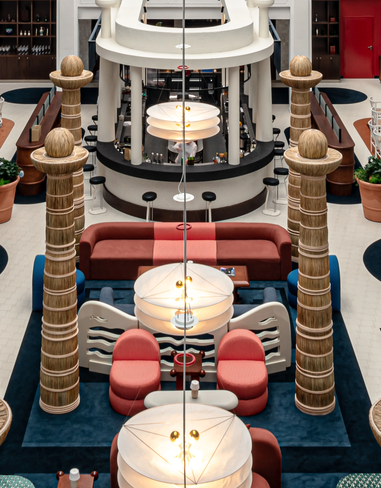 High-angle view of the lobby and lounge area, a lifestyle space designed by the Experimental Group for a complete guest experience.