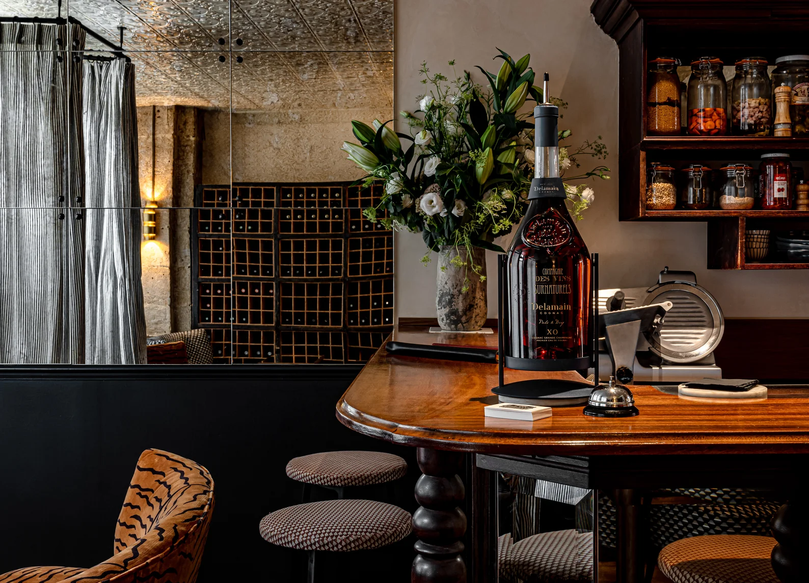 Wooden bar counter and refined decor by Experimental Group