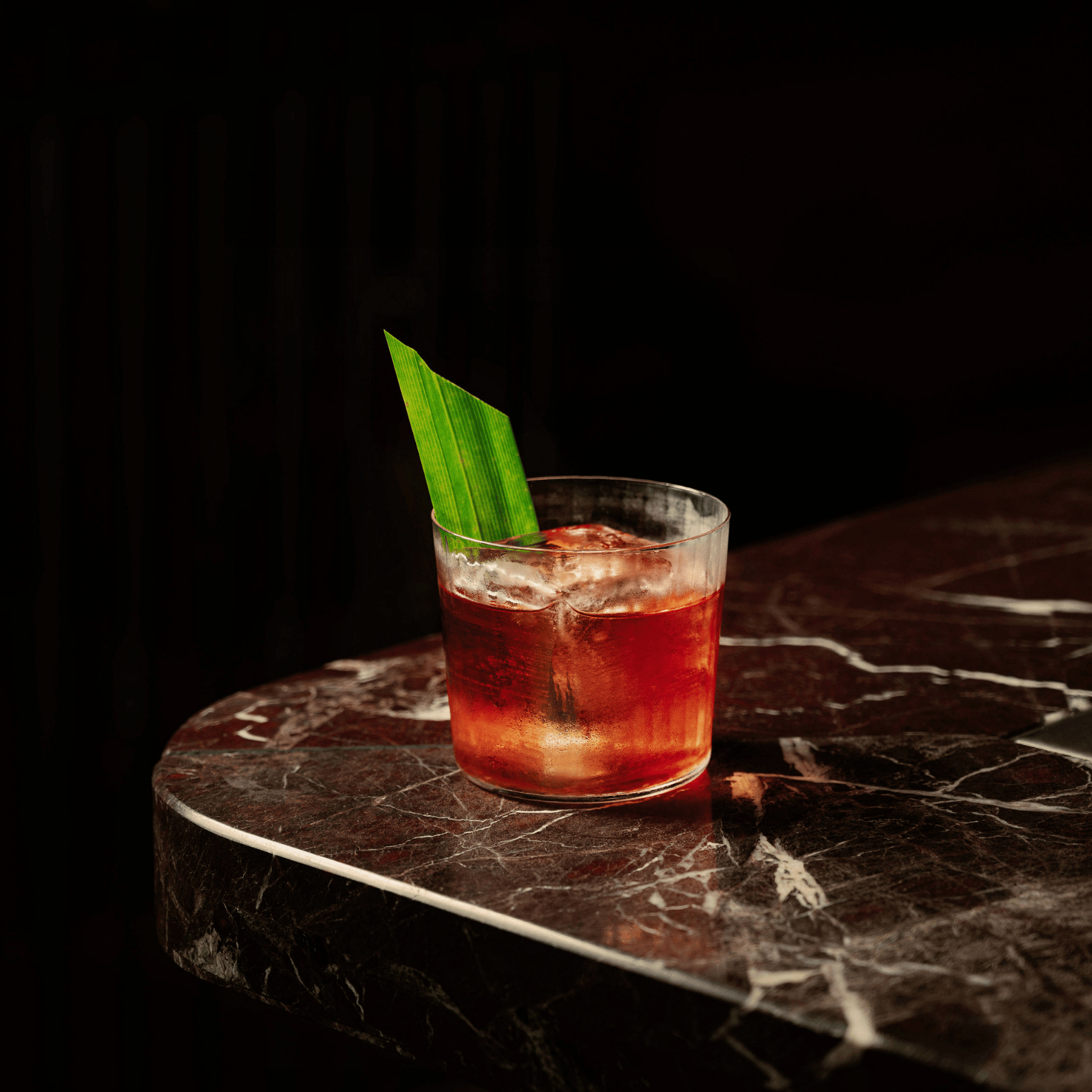 Cocktail on floor by shoe.
