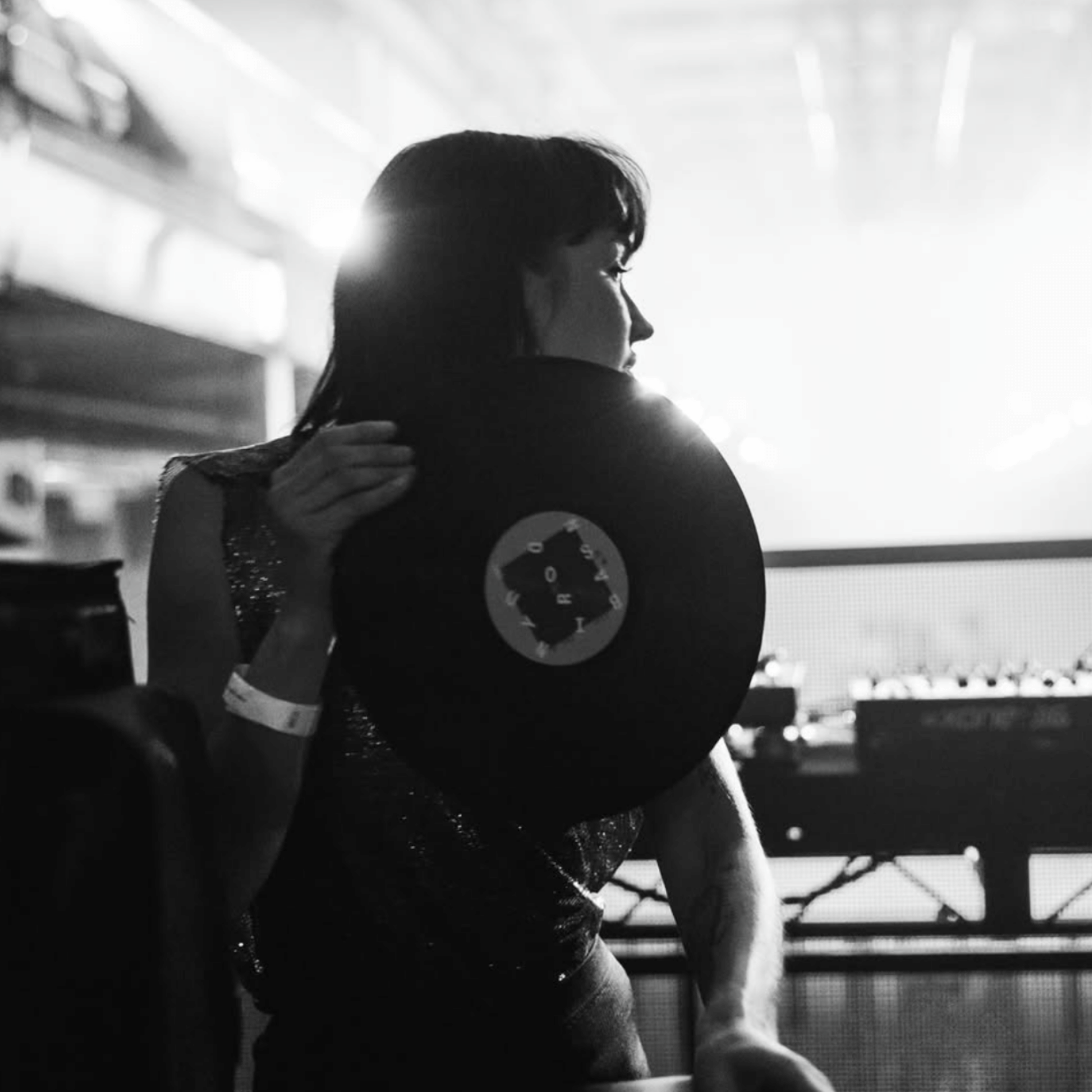 Woman DJing.