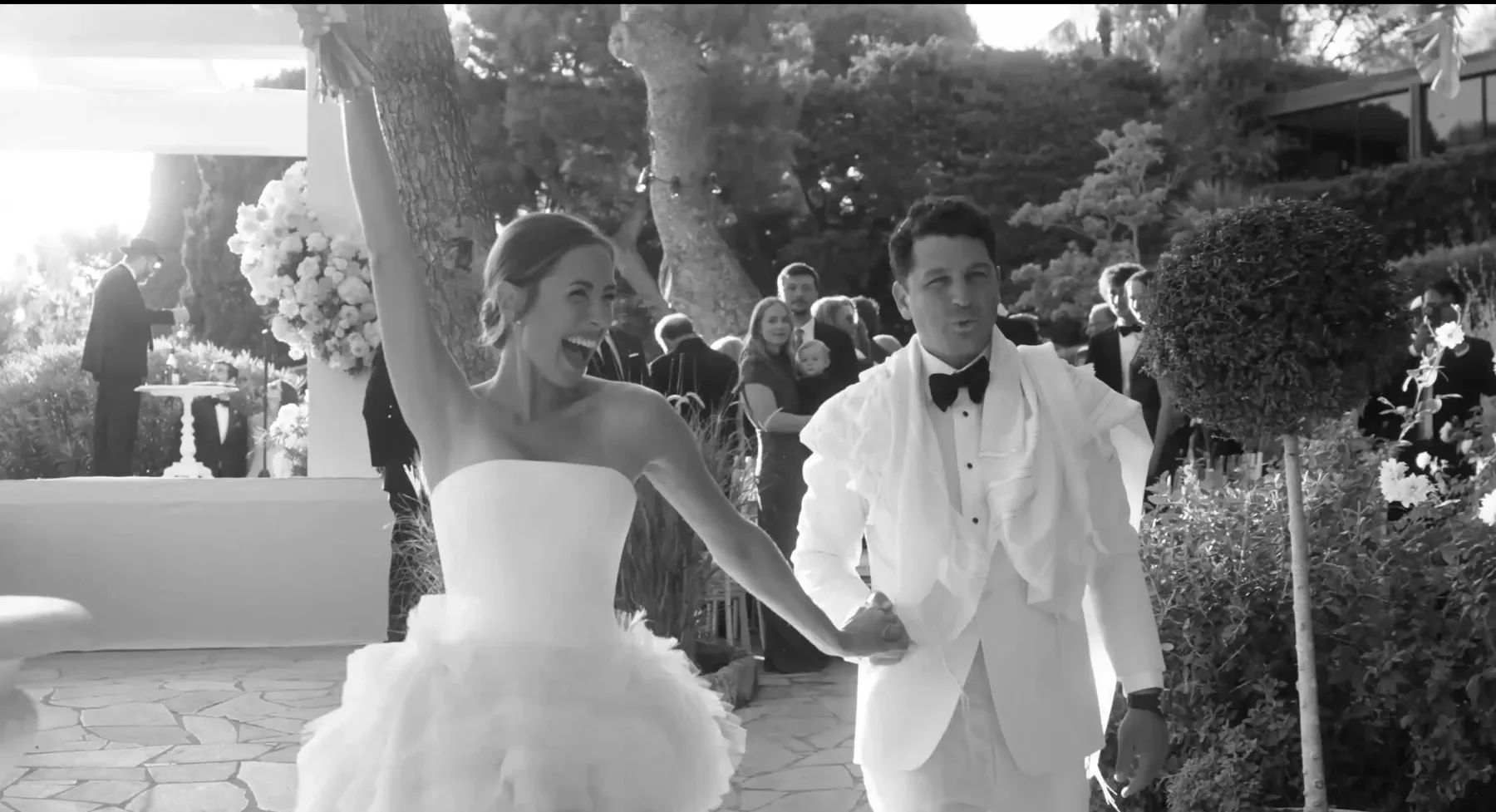 Bride and groom leaving their ceremony at Four Seasons Cap Ferrat
