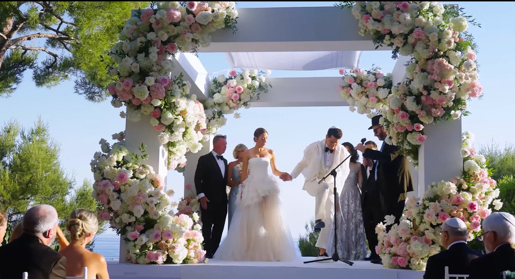 Floral chuppah ceremony at Four Seasons Cap Ferrat overlooking the Mediterranean