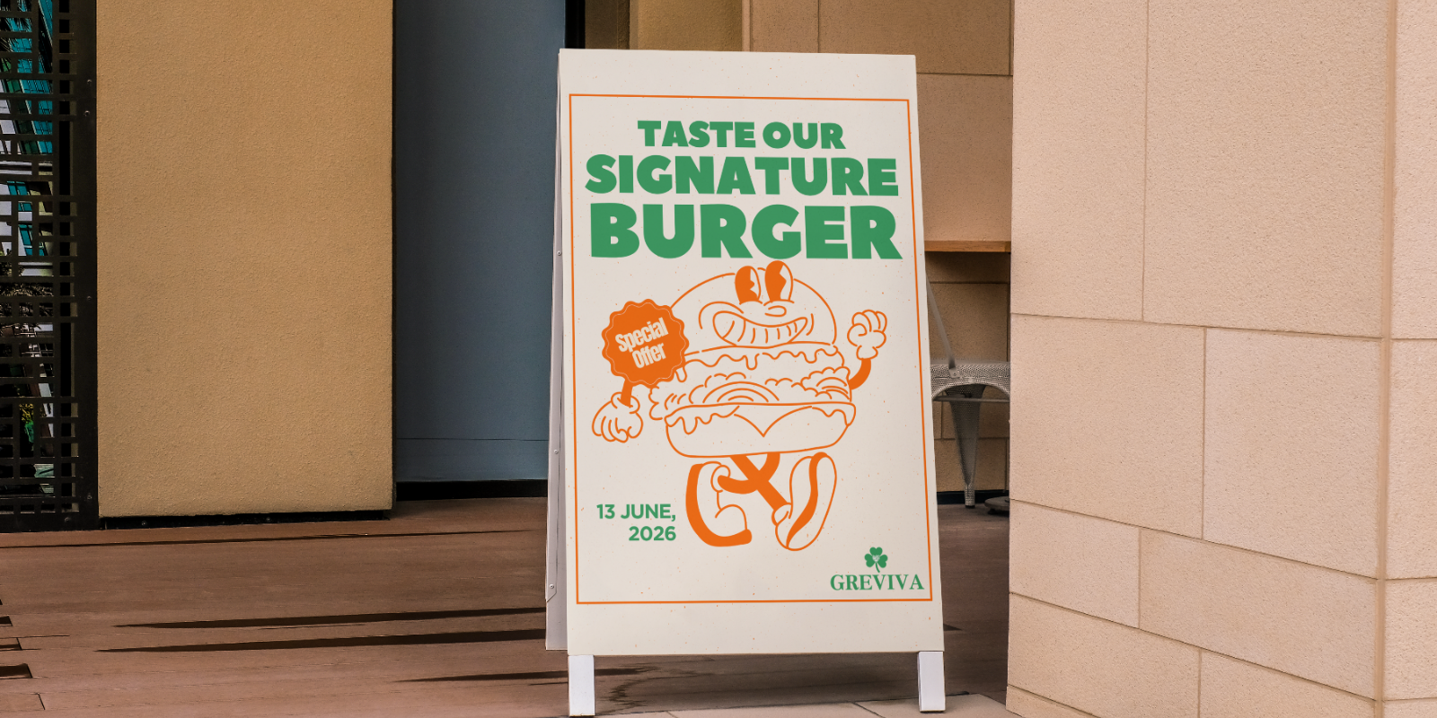 Signboard advertising Greviva's signature burger special offer on June 13, 2026 with cartoon burger graphic.