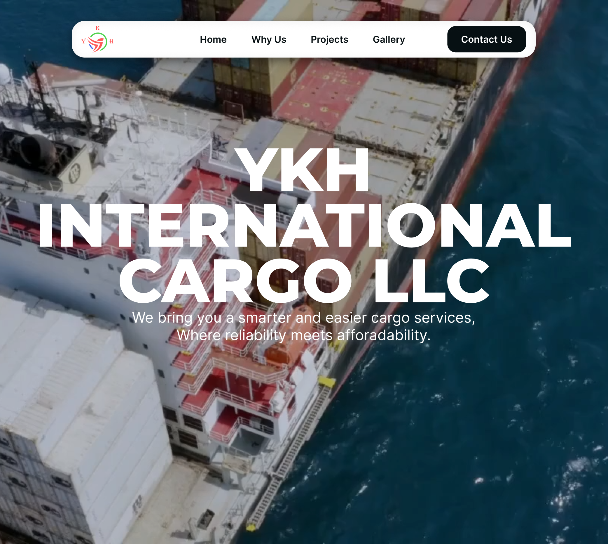 Top view of a cargo ship loaded with containers sailing on the ocean.