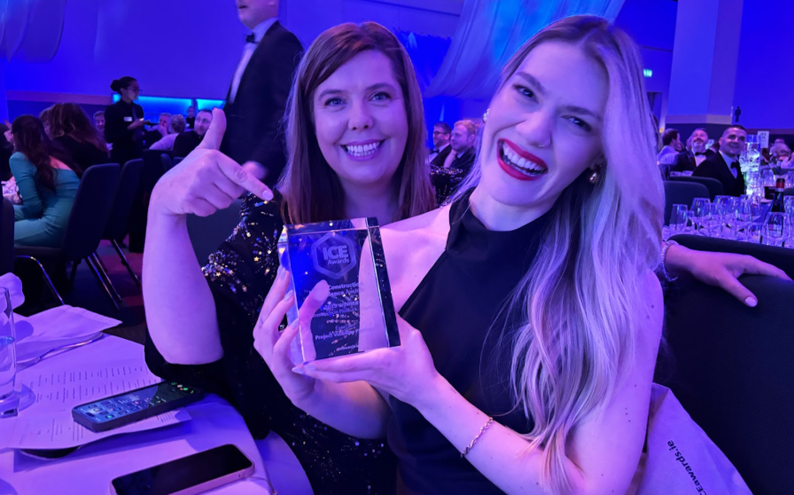 Evercam team members holding the ICE Award trophy during the awards ceremony