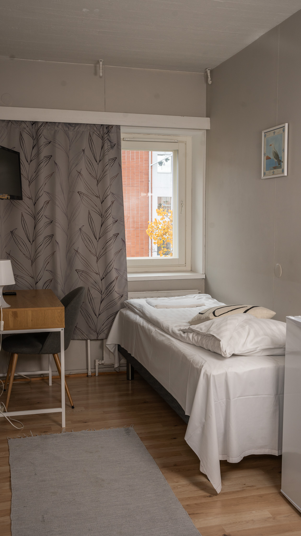 image of a cozy reading nook with a bestselling book on a side table