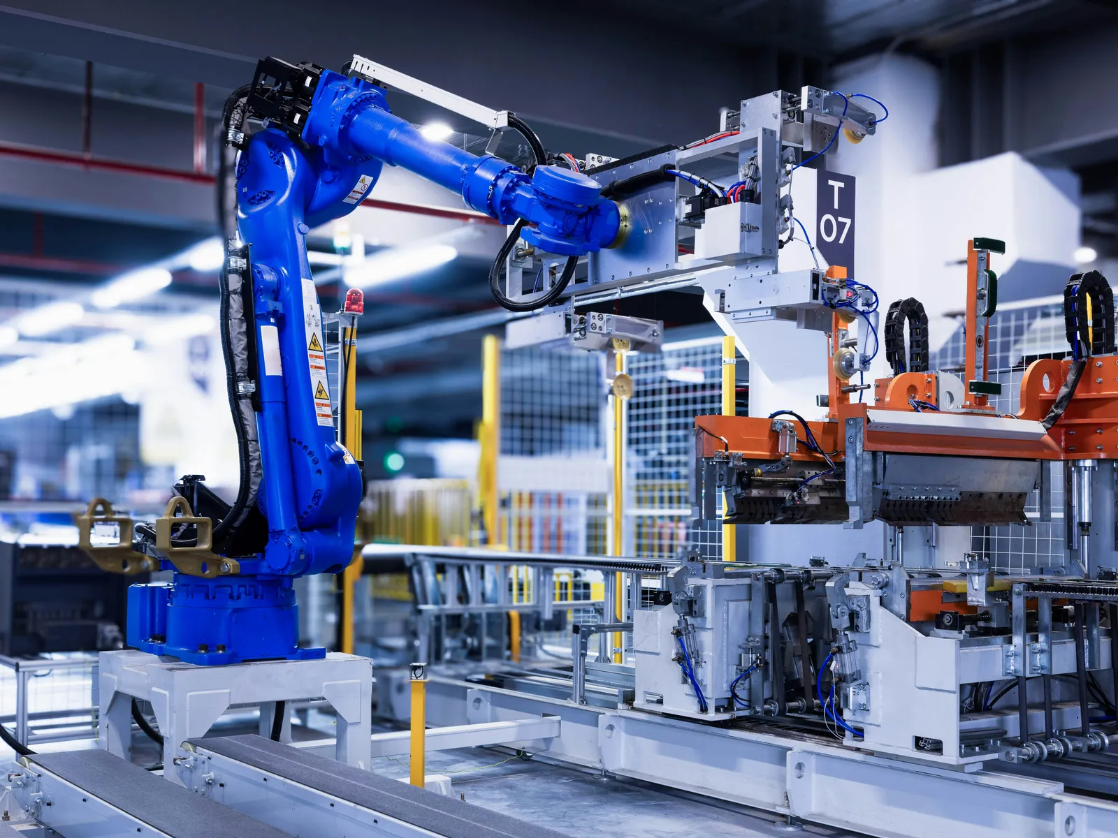 Close-up of a shiny car engine showing pulleys, belts, and metal components.
