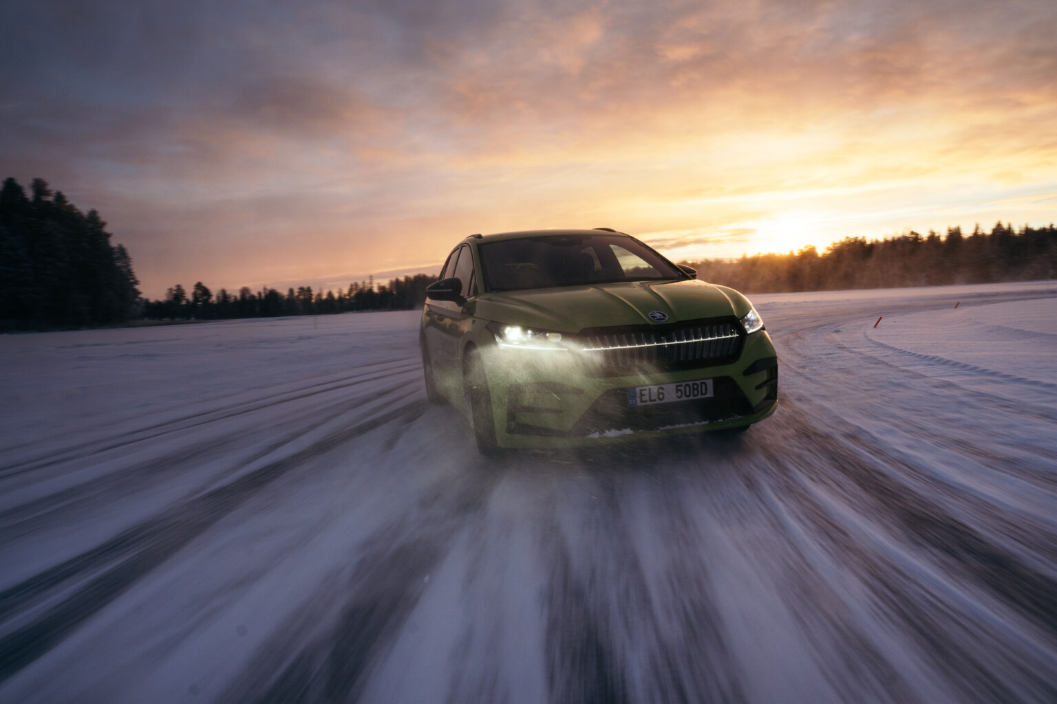 A Skoda on the snow-lined ice driving track in Östersund, Sweden