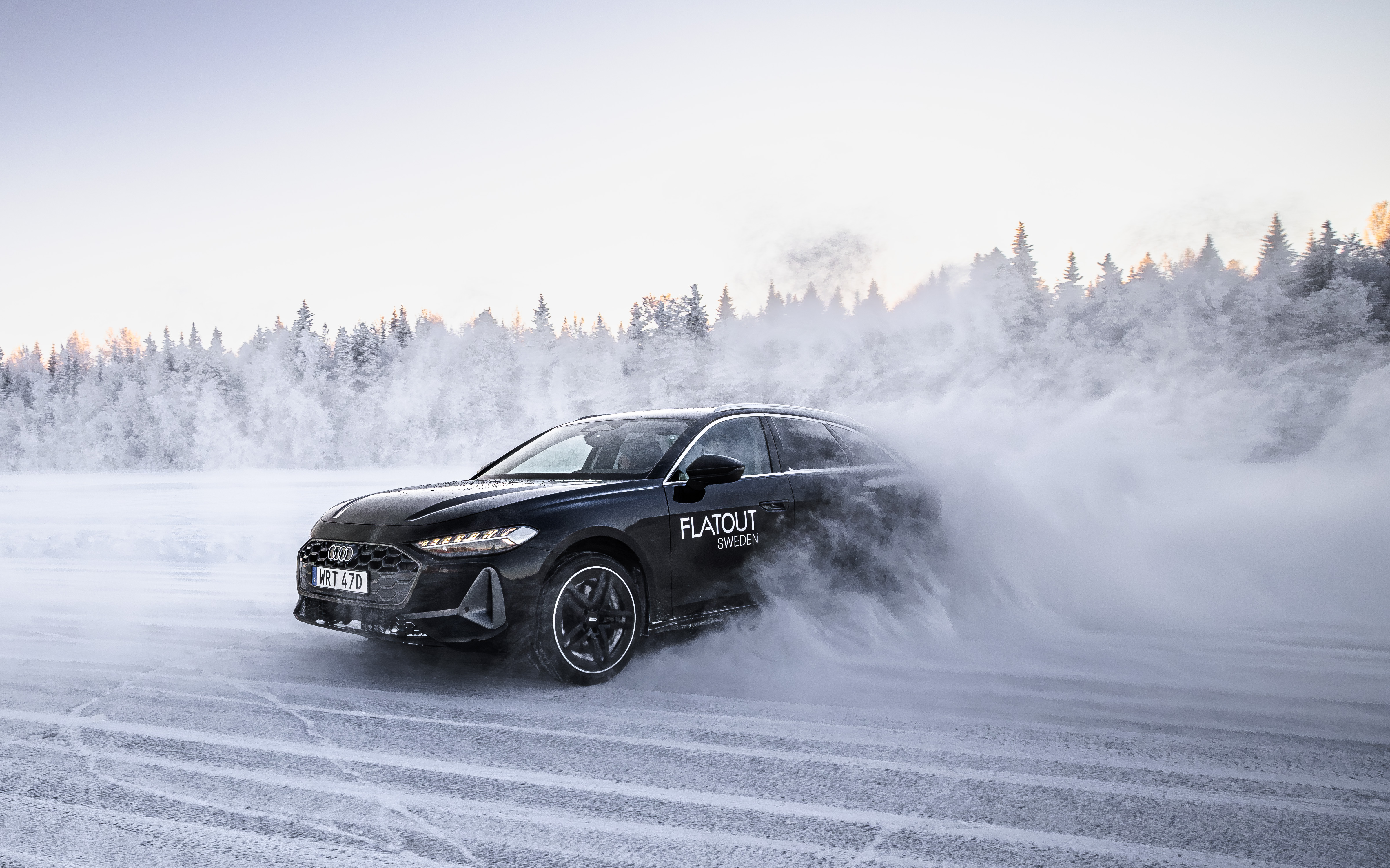 Close-up of an Audi on the frozen lake ice track in Östersund, Sweden