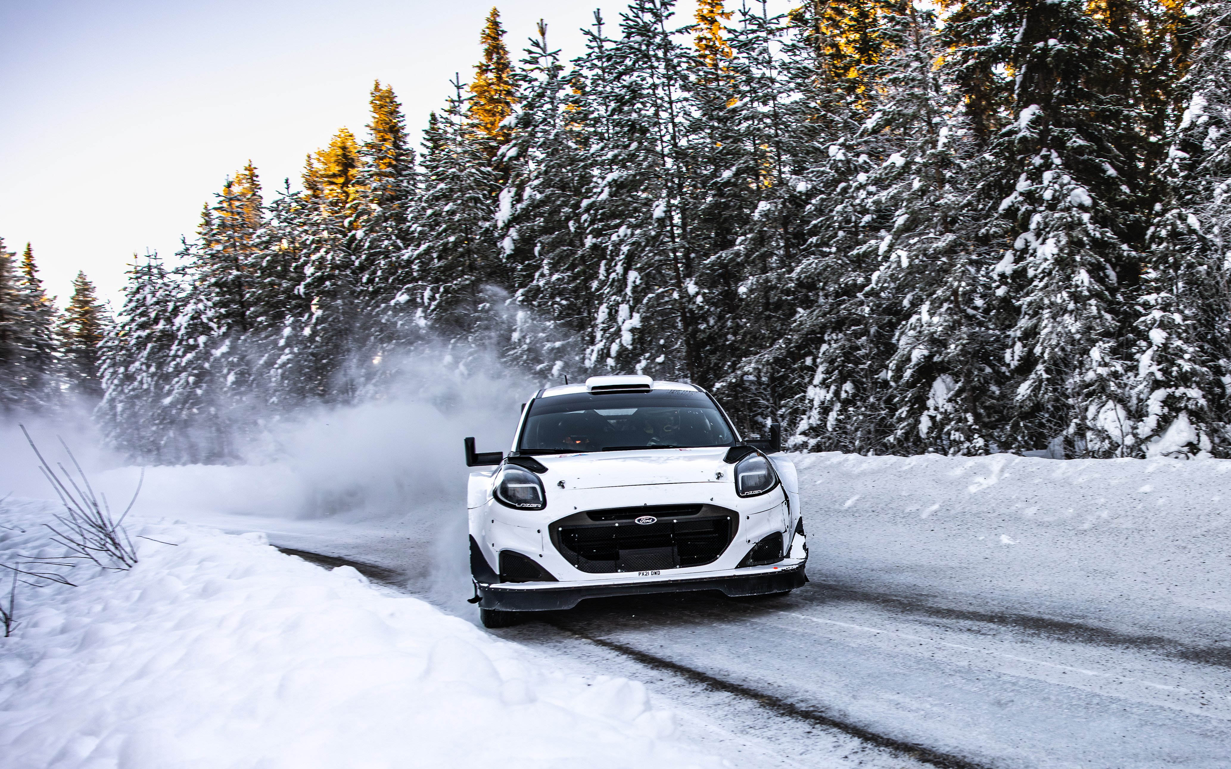 A rally test car drifting on the ice track in Jämtland, Sweden