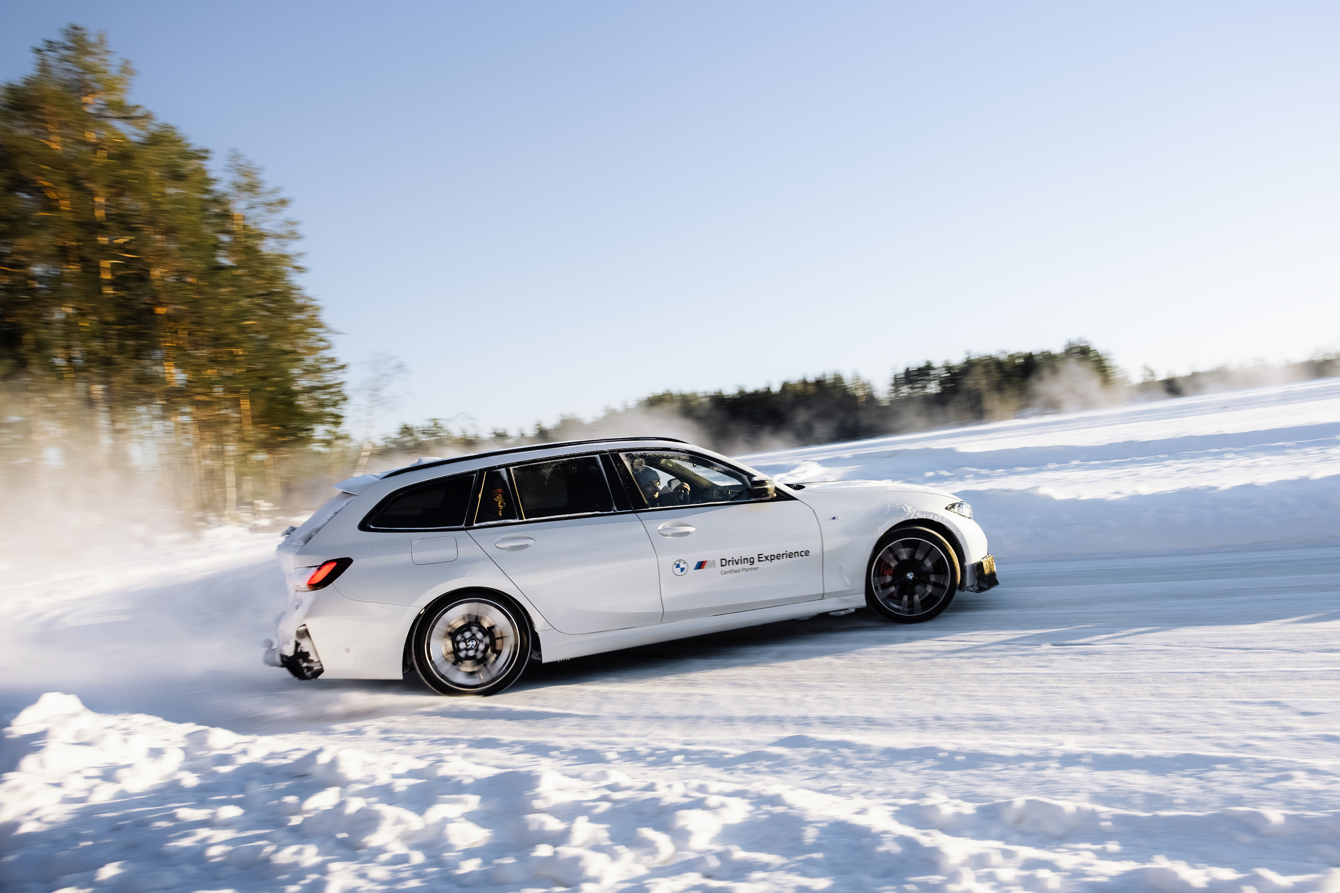 A BMW sliding across the frozen lake in Kall/Åre, Sweden