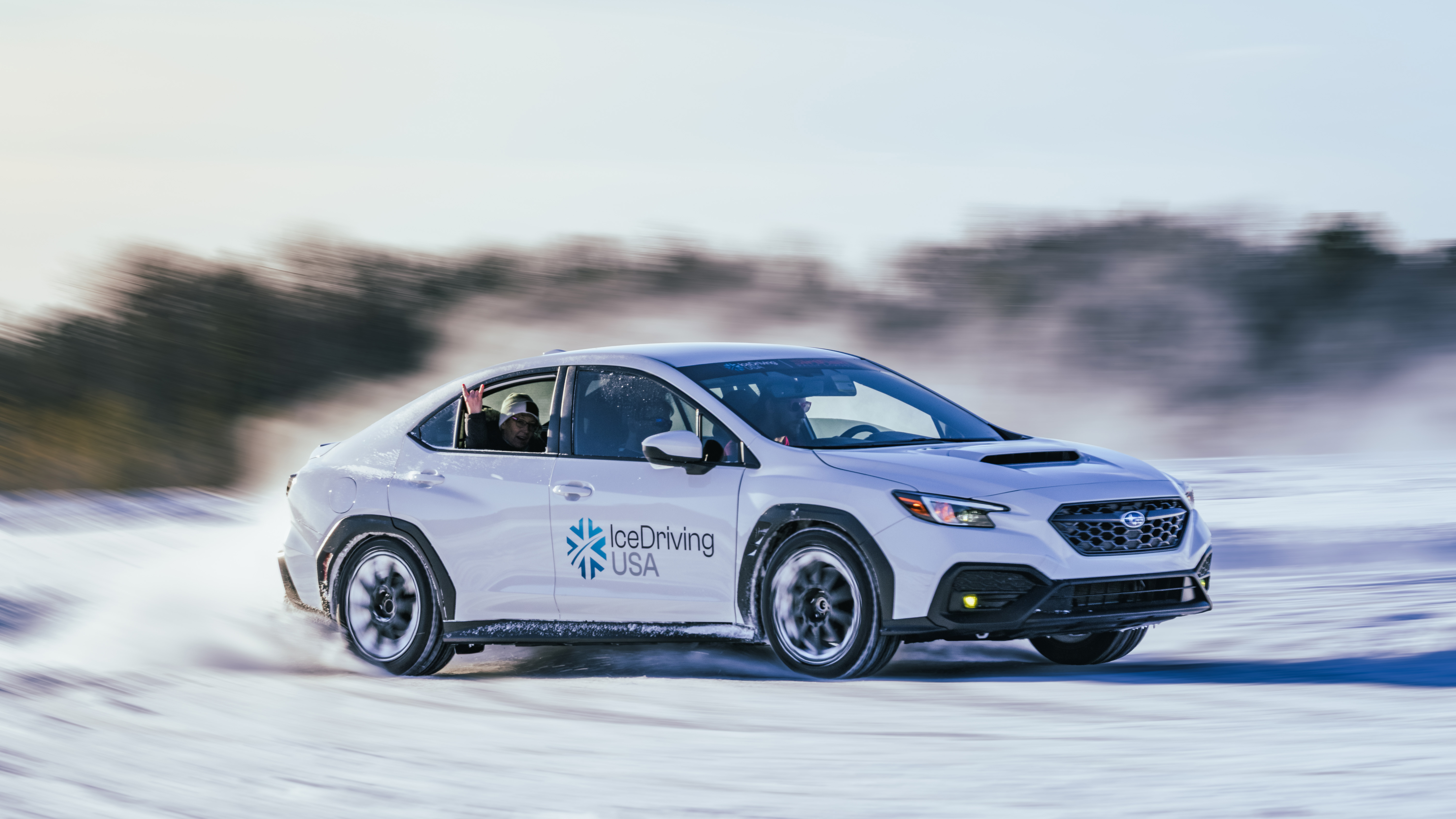 Close-up of a Subaru WRX on the frozen lake ice track in Eagle River, Wisconsin