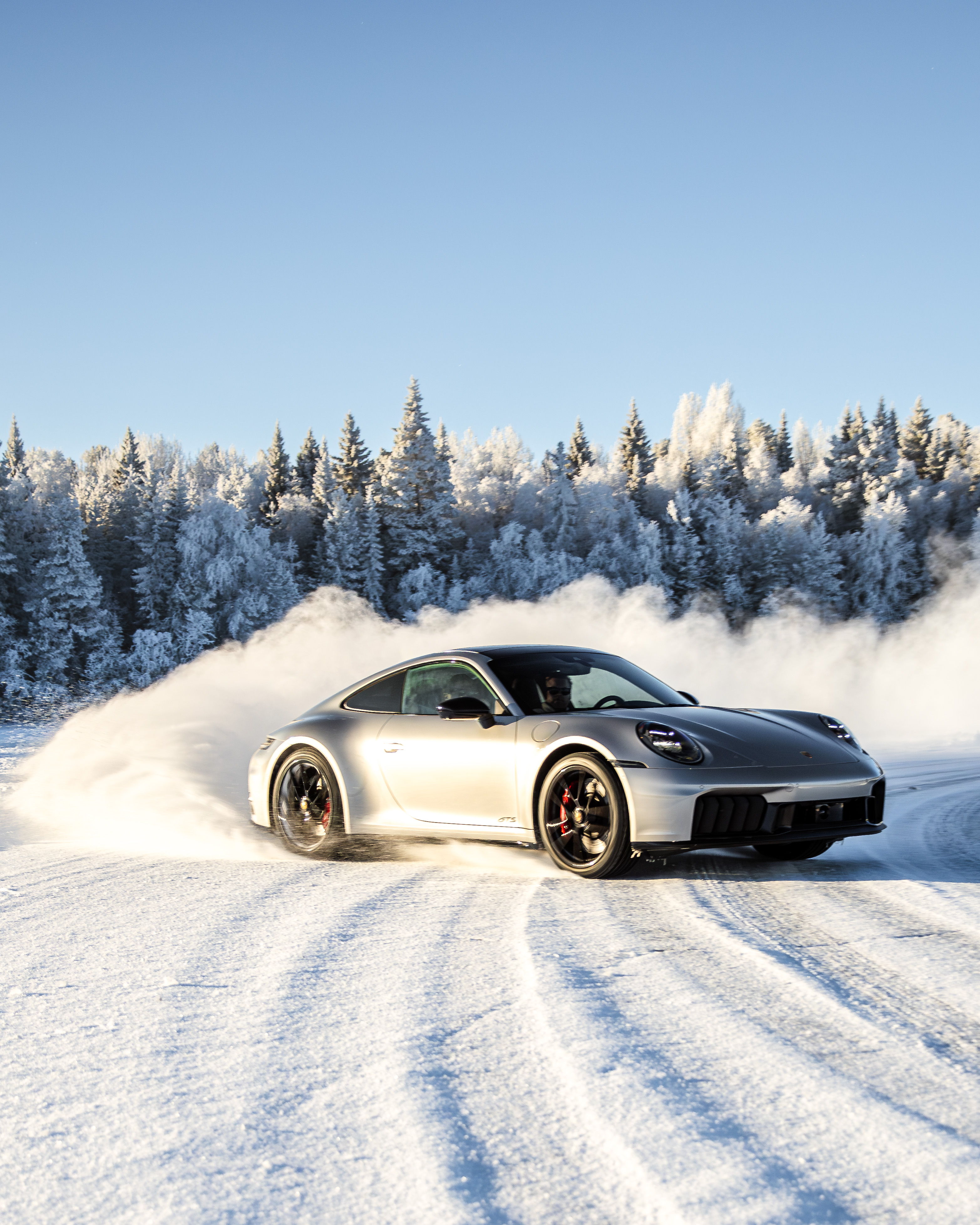 A Porsche drifting on the ice track in Östersund, Sweden