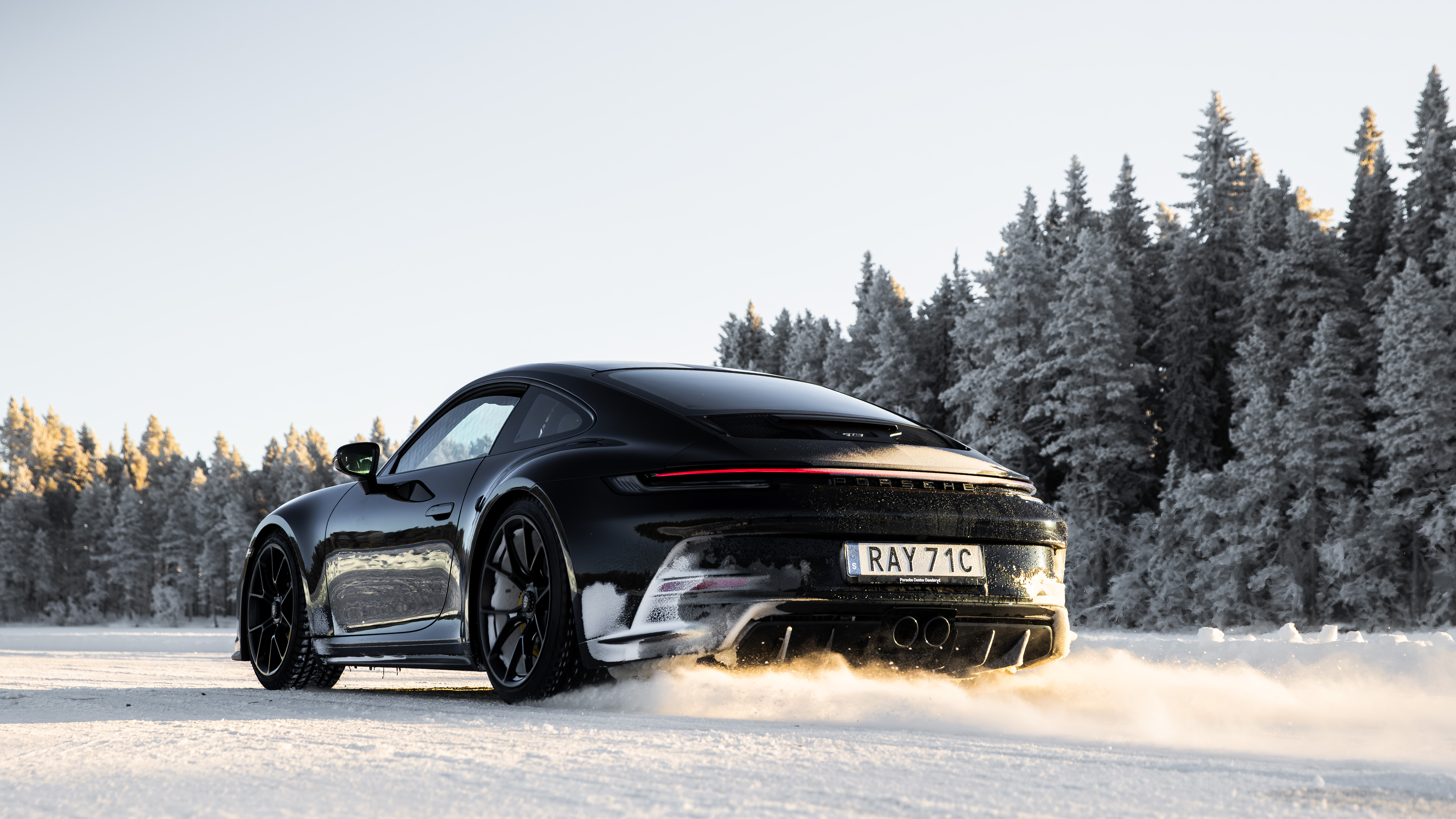 Close-up of a Porsche on the frozen lake ice track in Östersund, Sweden