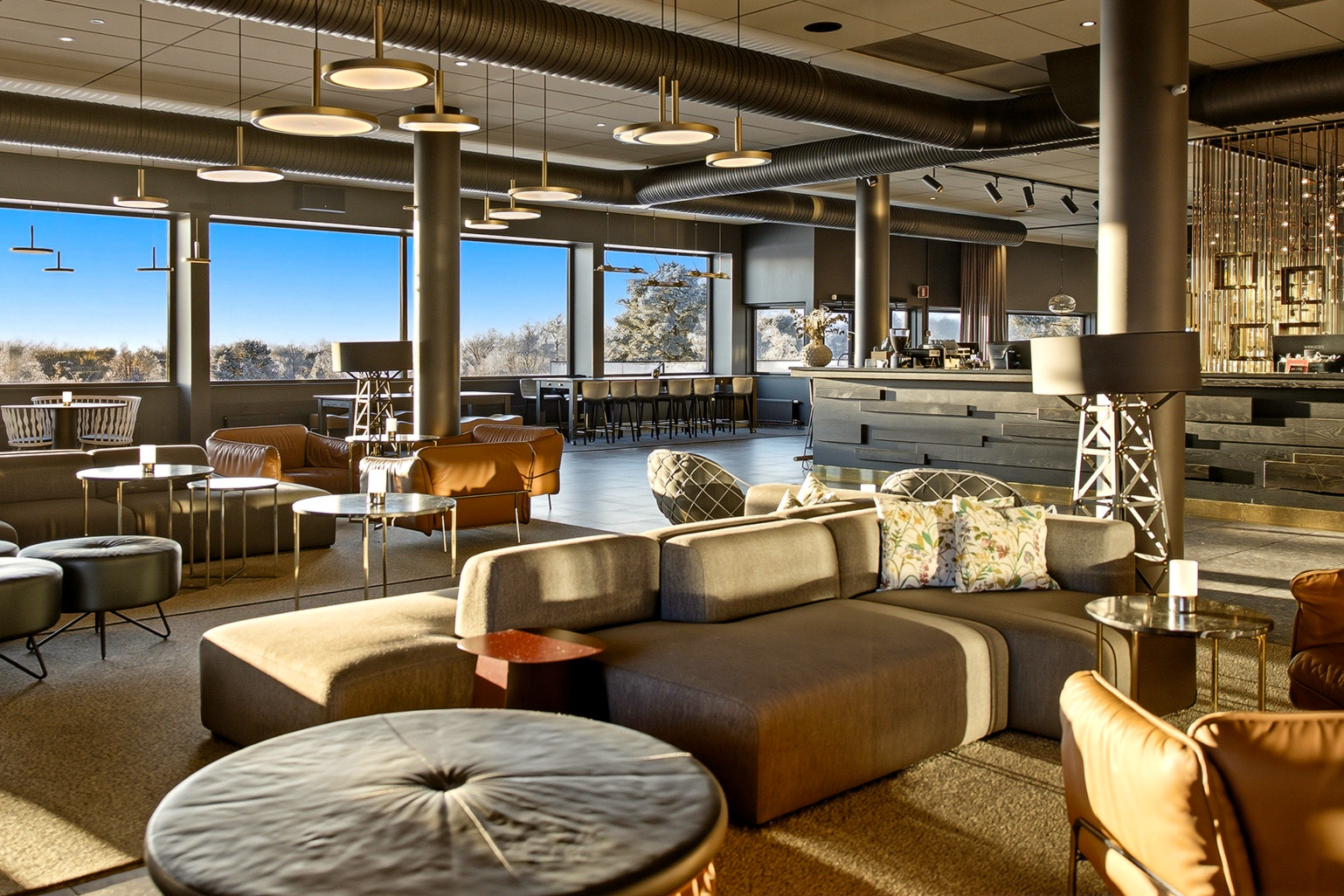 Restaurant with large windows overlooking the frozen lake