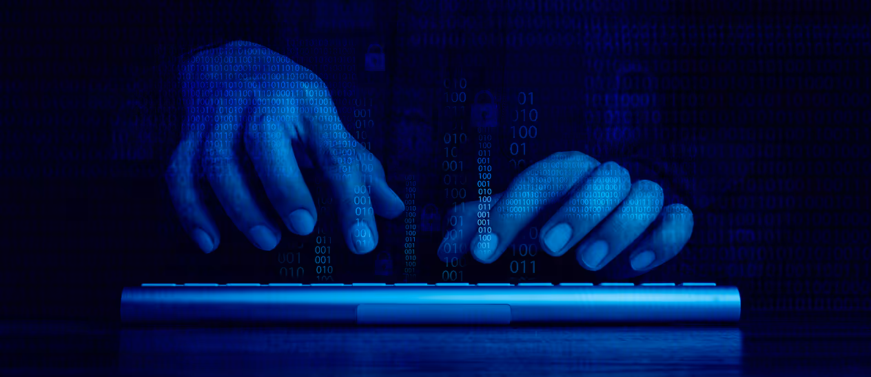 Fingers typing on a keyboard with digital binary code overlay symbolizing cybersecurity or hacking.
